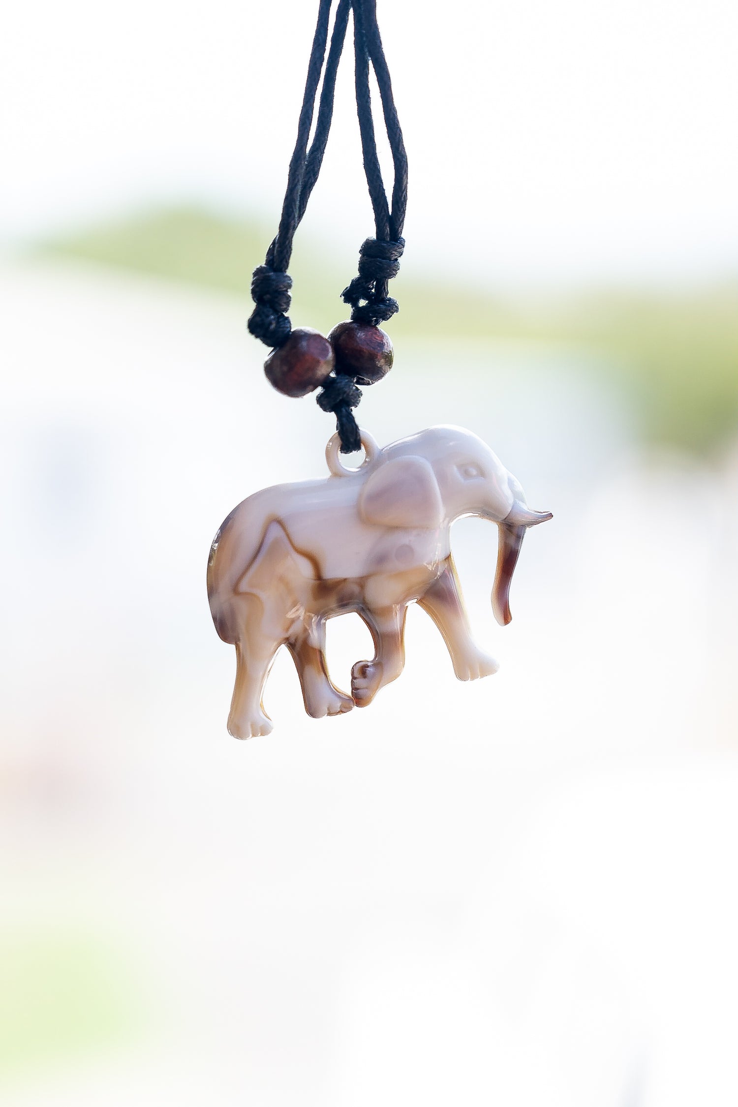 corded elephant necklace