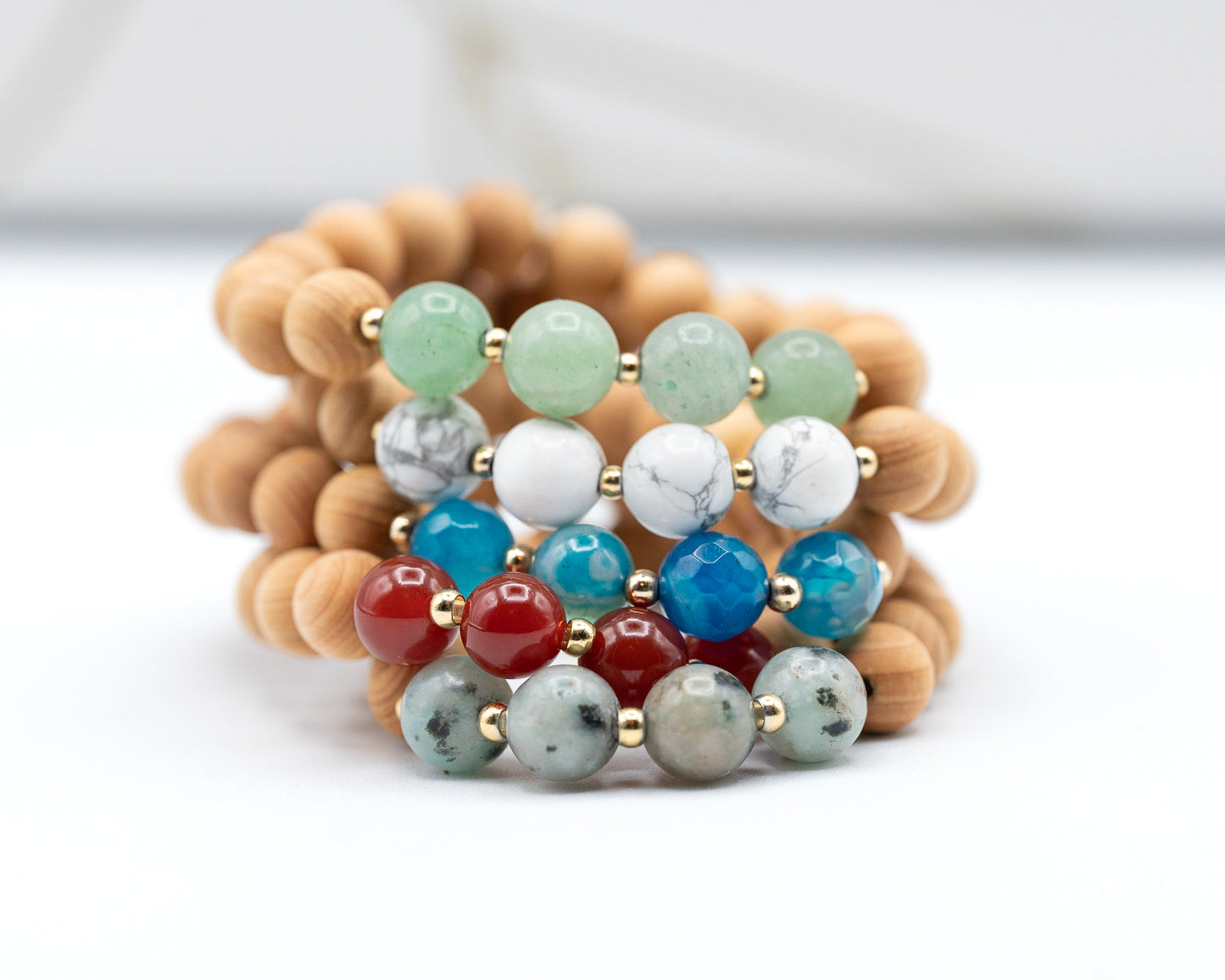 Light Brown Sandalwood Bracelets, with accent gemstones in blue, green, red, white and grey